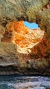 An unusual coastal cave, famous for its distinctive vaulted opening