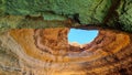 An unusual coastal cave, famous for its distinctive vaulted opening symbol of Portugal