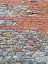 Unusual colorful background and texture of the brickwork of the old wall of the ancient building, full frame. Royalty Free Stock Photo