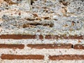 Unusual colorful background and texture of the brickwork of the old wall of the ancient building, full frame Royalty Free Stock Photo