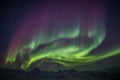 Unusual colorful Northern Lights - Arctic winter landscape