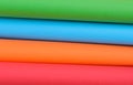 unusual composition of colored paper, a bright colors on a white background, multi colored paper