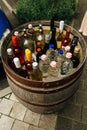 Unusual drink and alcohol bar in wooden barrel, creative service