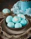 Unusual Easter on dark old background. Concept of new life, rebirth. Rustic style