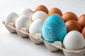 Unusual Egg Among Ordinary Eggs Royalty Free Stock Photo