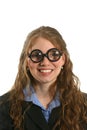 Unusual expression with smile on woman with thick glasses in business suit