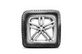 an unusual funny tire with alloy wheels white isolated square