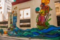 Unusual graffiti on the house, drawing on the wall: sewer pipes, water, man. Havana. Cuba