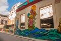 Unusual graffiti on the house, drawing on the wall: sewer pipes, water, man. Havana. Cuba