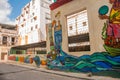 Unusual graffiti on the house, drawing on the wall: sewer pipes, water, man. Havana. Cuba