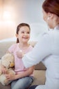 Optimistic girl admiring female doctor Royalty Free Stock Photo