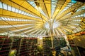 an unusual light roof over the Sony center in Berlin and its reflection in the glass windows of an office building