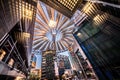 an unusual light roof over the Sony center in Berlin and its reflection in the glass windows of an office building