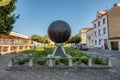 Unusual monument in the form of a metal ball with embossed pictures. Litomysl, Czech Republic