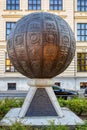 Unusual monument in the form of a metal ball with embossed pictures. Litomysl, Czech Republic