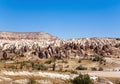 Unusual mountain landscape of Cappadocia in the daytime.