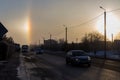 An unusual natural phenomenon is a halo, an atmospheric optical phenomenon around the sun in the early morning Royalty Free Stock Photo