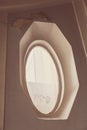 Unusual oval window Royalty Free Stock Photo