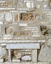 Unusual random shapes stone wall closeup