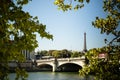 Unusual rare view of Eiffel tower and Pont de la Concorde with a piece of Palais Bourbon to the left