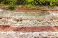Unusual rock formations in the form of multi-colored layers of rocks Royalty Free Stock Photo