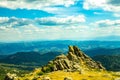 Unusual rocks in the mountains. Peak of mountain Sinyukha, the highest mountain Kolyvan ridge. Altai Krai, Russia Royalty Free Stock Photo