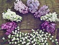 Unusual round frame of lilac and lily of the valley. Royalty Free Stock Photo