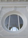 Unusual round window of the building. Royalty Free Stock Photo