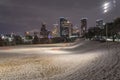 Unusual snow in Downtown Houston at night with snowfall at Eleanor Park Royalty Free Stock Photo