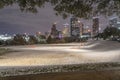 Unusual snow in Downtown Houston at night with snowfall at Eleanor Park Royalty Free Stock Photo