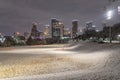 Unusual snow in Downtown Houston at night with snowfall at Eleanor Park Royalty Free Stock Photo