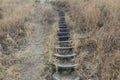 Unusual stairs made of rubber tires from the wheels up the hill