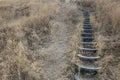 Unusual stairs made of rubber tires from the wheels up the hill