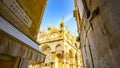 Unusual view of Basilica di San Marco from narrow street, Venice, Italy