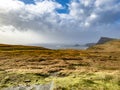 Unusual view of Neist Point with Lighthouse on the Isle of Skye during storm Callum in autumn Royalty Free Stock Photo