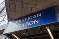 Unusual view of a sign for Barbican Station