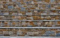 Unusual view of the steps from different stones of different colors