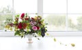 Unusual wedding composition with succulent flowers, grape, fig a