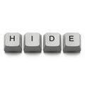 Uncover hidden digital secrets with these keyboard keys spelling out \'HIDE\' on a clean white background Royalty Free Stock Photo