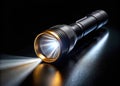 Unveiling the Secrets of Night A Powerful Handheld Light Pierces the Darkness Royalty Free Stock Photo
