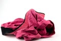 Unwashed pink underwear on white isolated background