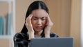Unwell female Asian korean japanese chinese girl millennial business woman tired exhausted worker manager stressful Royalty Free Stock Photo