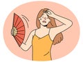 Unwell woman with handfan suffer from heatstroke