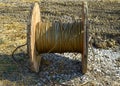 The unwinding of the high-voltage wire from the spool storage bay Royalty Free Stock Photo