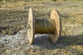 The unwinding of the high-voltage wire from the spool storage ba Royalty Free Stock Photo