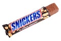 Unwrapped Snickers candy chocolate bar Royalty Free Stock Photo