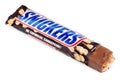 Unwrapped Snickers candy chocolate bar