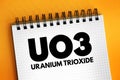 UO3 - uranium trioxide acronym text on notepad, abbreviation concept background