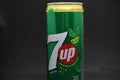 A 7up can against isolated black background