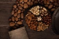 Up close mixed nuts in an old spice container